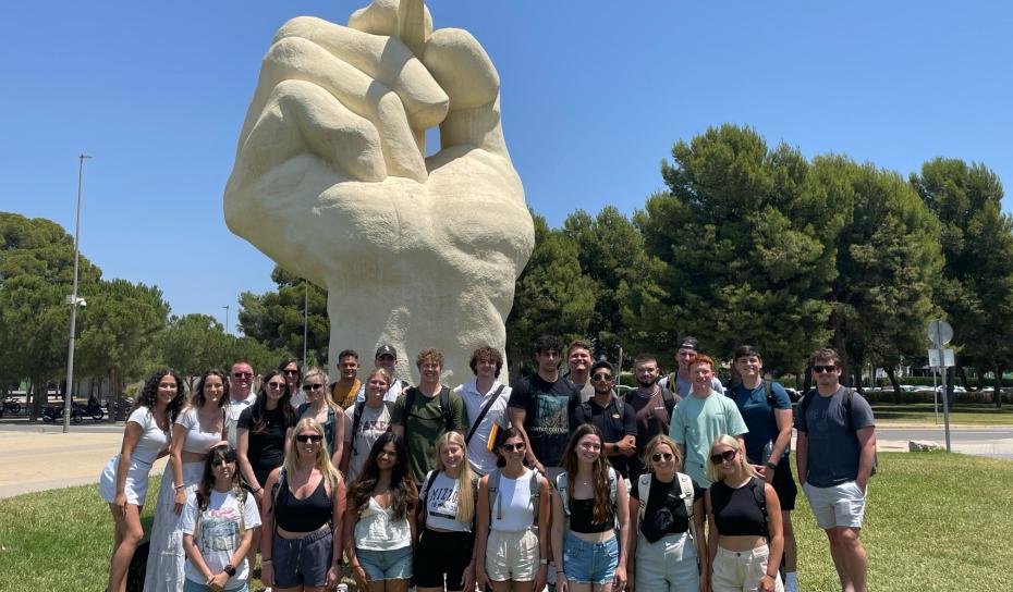 Students in Spain by sculpture