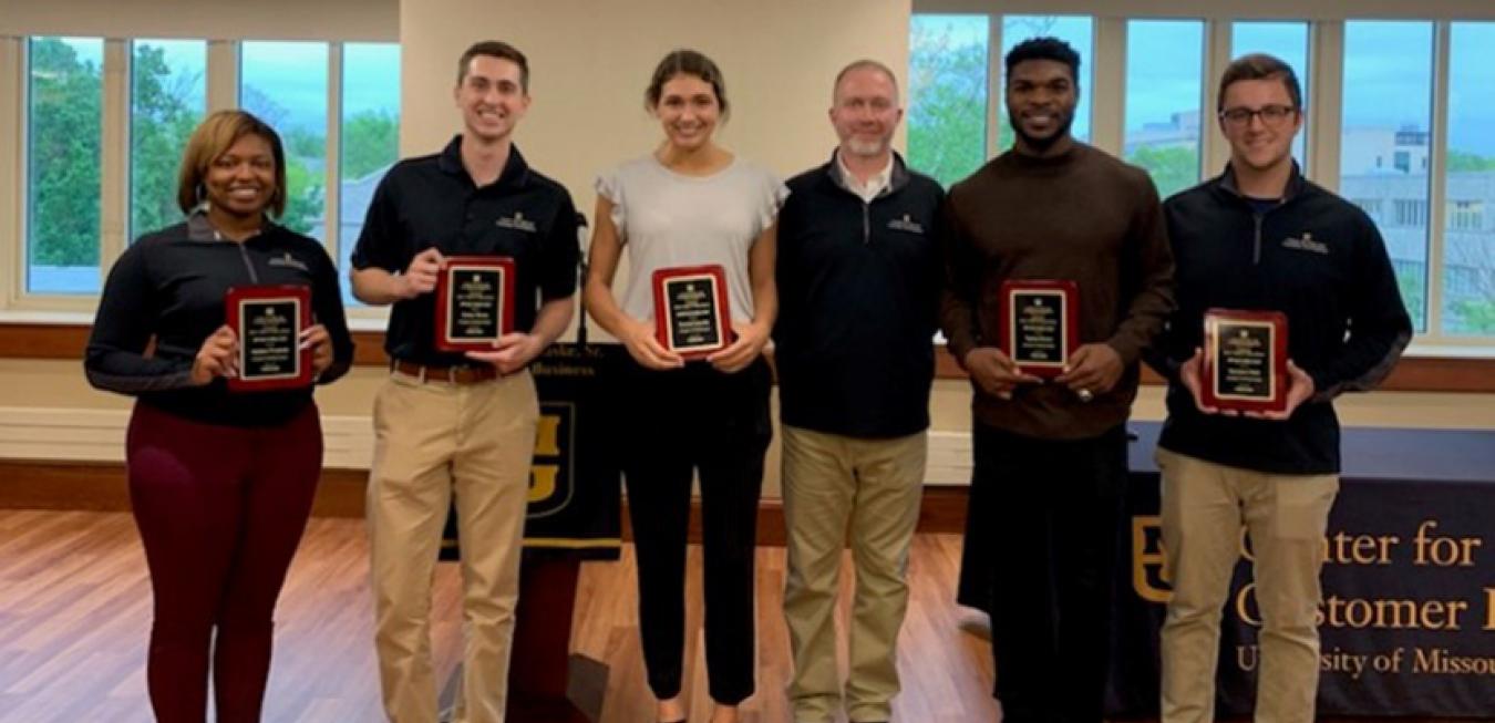 Image: CSCD student winners holding awards