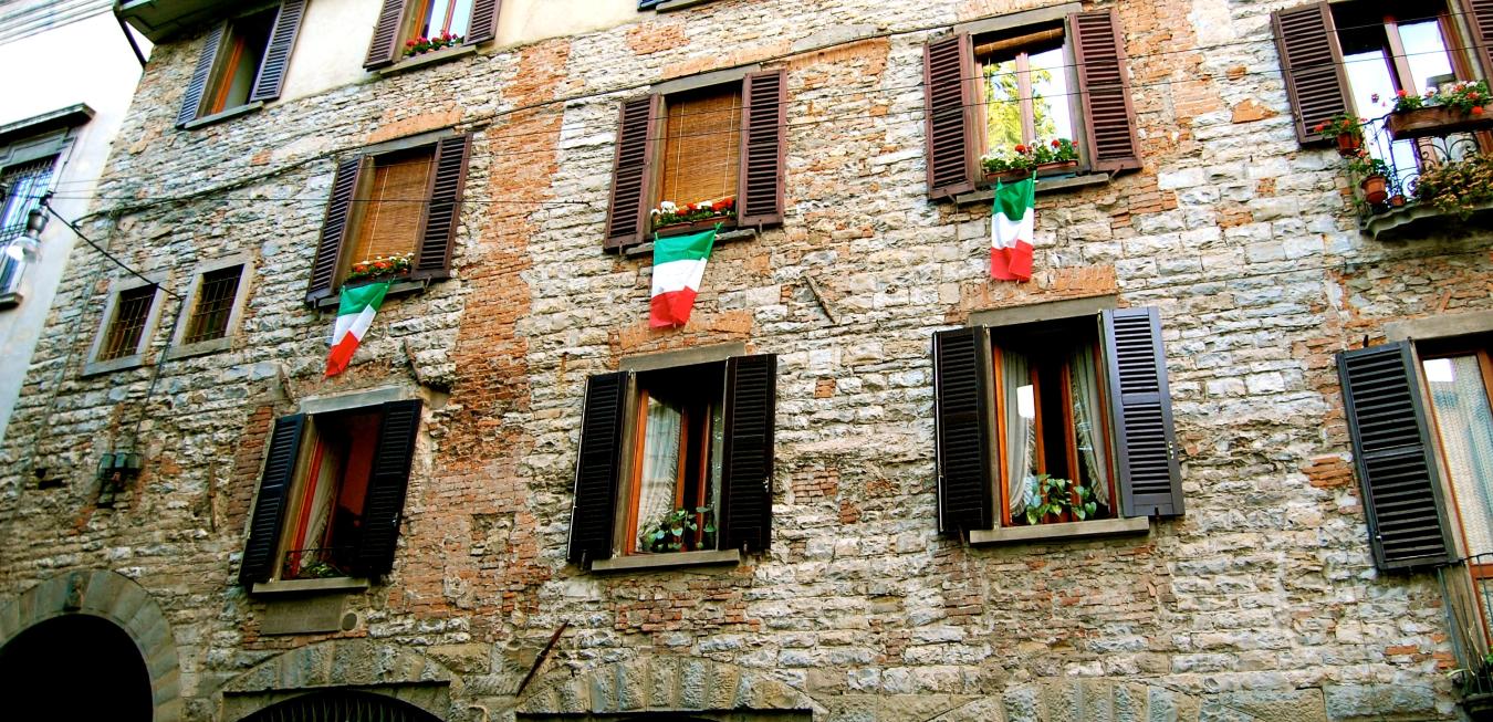 Bergamo, Italy building with flags hanging