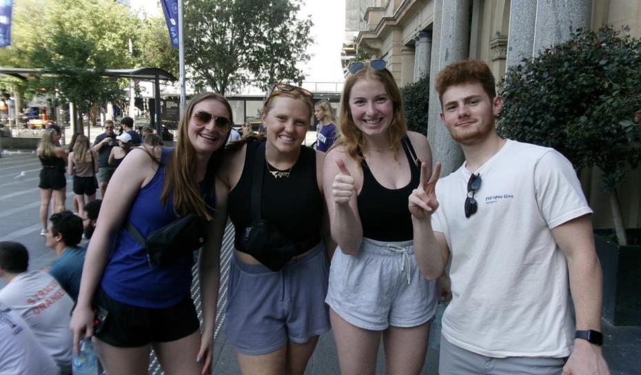A group of MU students on the sidewalk in AUS.