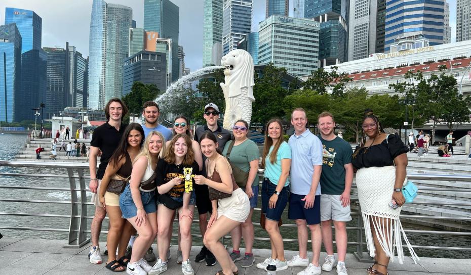 group of MU students in front of fountain in SE Asia