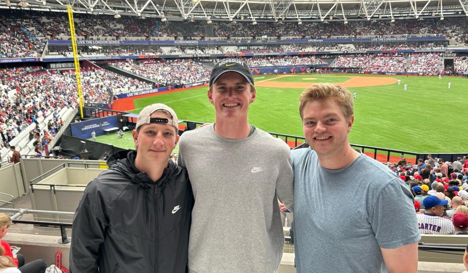 3 MU students at a sporting event in London