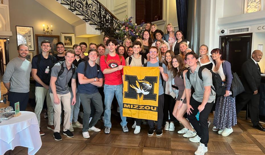 Group of students with MU flag 