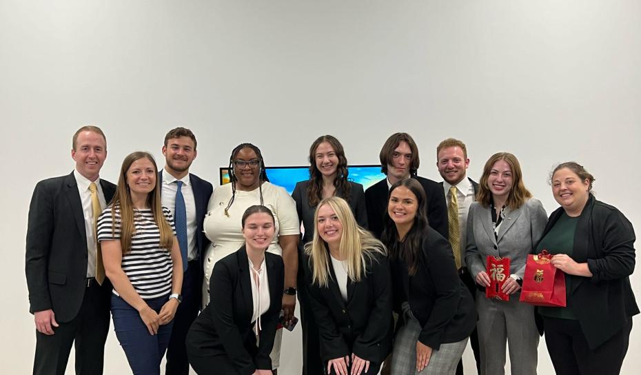 Student Interns standing in group for photo in SE Asia