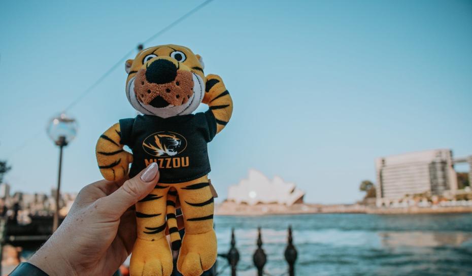 Truman in front of the Sydney Harbor Bridge