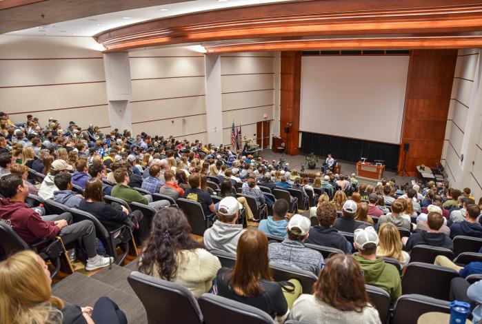 Tyler Shultz speaking in Cornell Hall