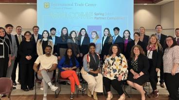 ITC students led by Rasmussen present their findings.