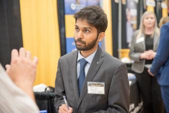 Student dressed in a suit at Trulaske College of Business Career Fair