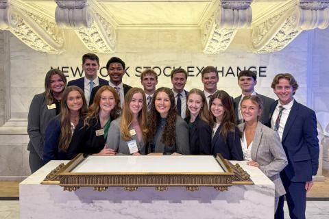 Group of students in the lobby of the New York stock exchange