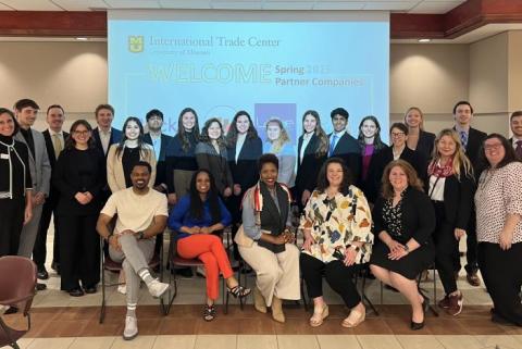 ITC students led by Rasmussen present their findings.