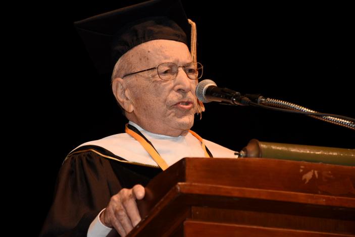 Image: Alumnus Richard Orin speaking after receiving his honorary doctorate.