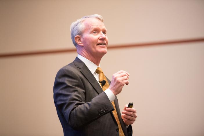 Image:  Alumni Gerald Carlson speaks at annual Orin Ethics Symposium