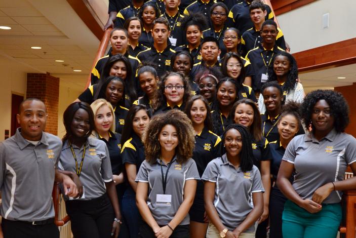 Image: 2015 Trulaske Business Academy student counselors with high school students