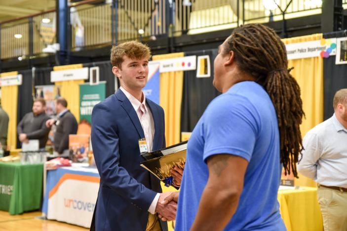 Image: Student shaking employer hand