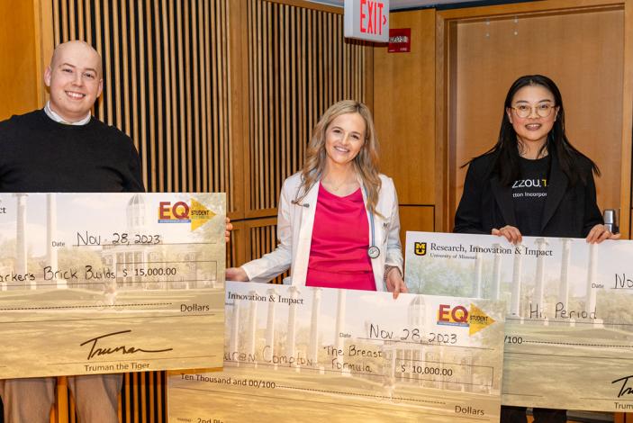 Image: Top three finishers in the Entrepreneurship Quest competition post for a picture