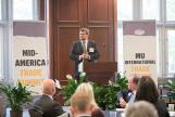 Image: Martin Butler speaks to the assembled group at the Mid-America Trade Summit