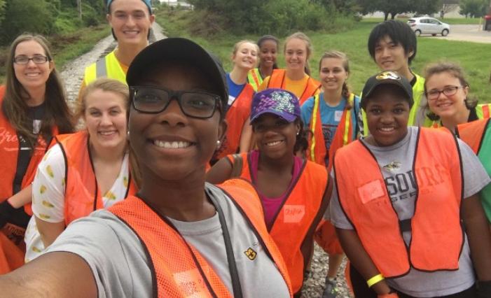 Masato Takeshita with a group of fellow volunteers