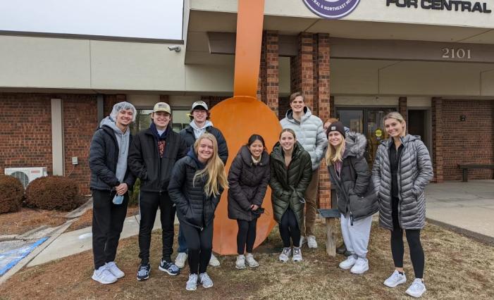 Members of the Alpha Chapter of Delta Sigma Pi volunteered at a local food bank.  