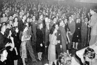 Image: Students crowded around the Raymond Scott orchestra at the 1947 Derby Dance 