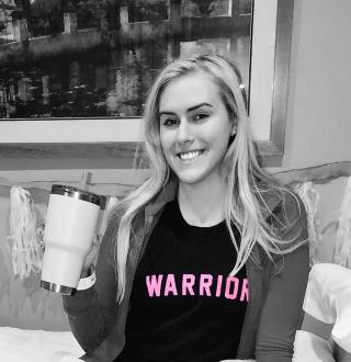 Nicole Cummings in a "Warrior" shirt