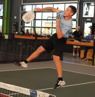 Dylan Frazier plays in a recent pickleball tournament at The Tennis Club at Newport Beach, southwest of Los Angeles.