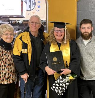 Jamie Wilson with family at commencement 